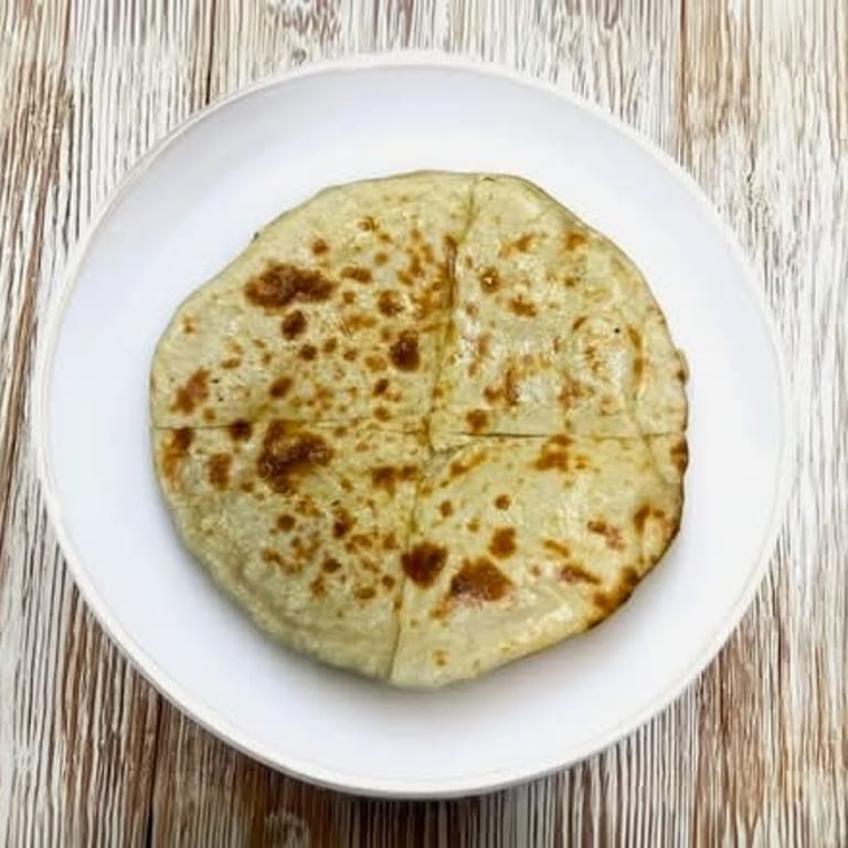 Savor Our Freshly Baked Naan